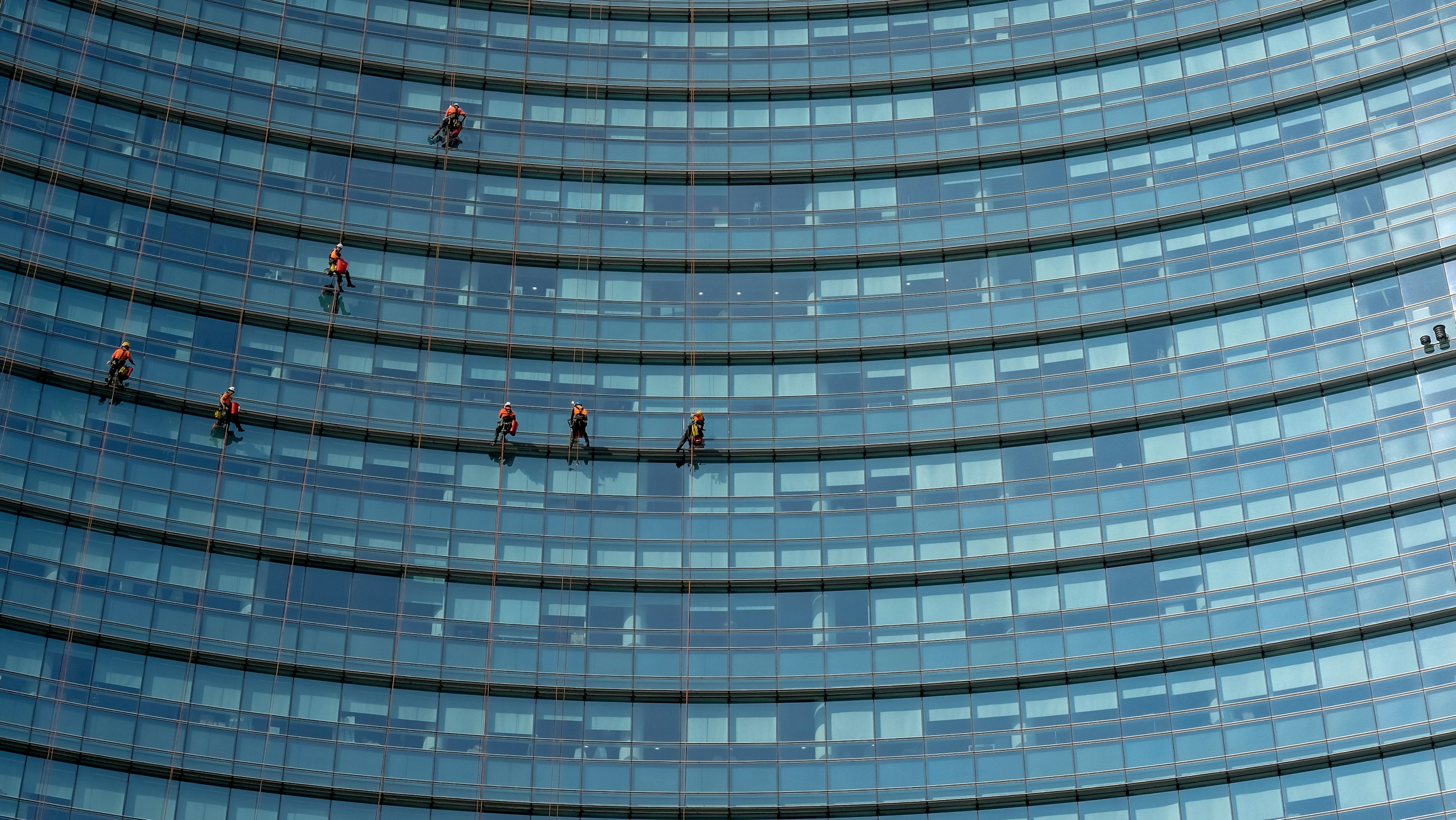 Window cleaners on building
